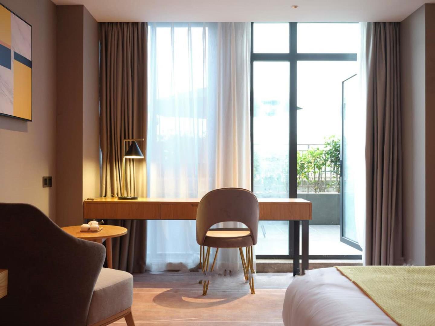 Baian Art Hotel Luzhou Exterior photo